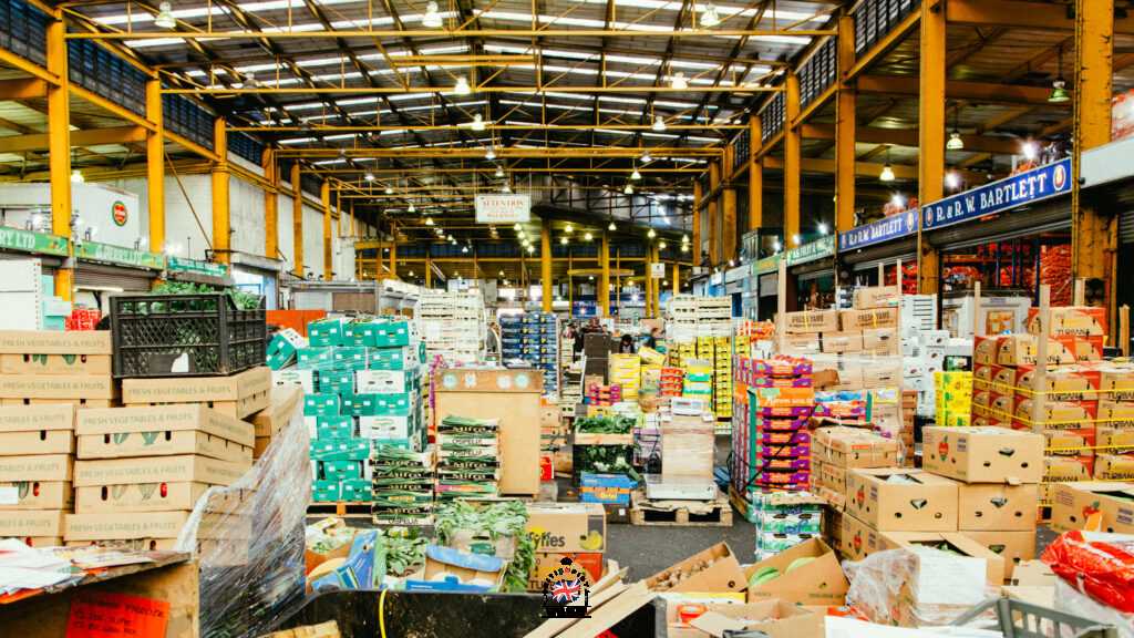 Wholesale buyers negotiating prices at Birmingham markets